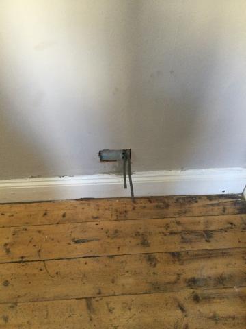 Installation of a new double socket next to a bed by an electrician in Bath