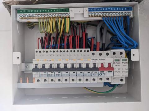Installation of a new RCBO fuseboard with a surge protective device.