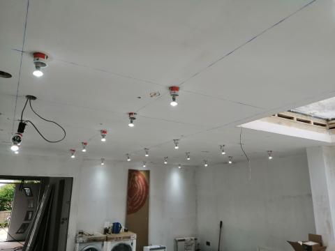 Lots of Gu10 downlights installed by an electrician using the architects drawings in Chippenham