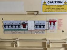 A picture of an old fuseboard which is not fully protected by RCD's. This fuseboard should be upgraded by a registered electrician. 