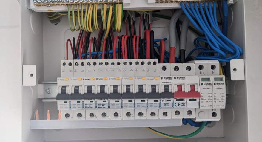 Installation of a new RCBO fuseboard with a surge protective device.